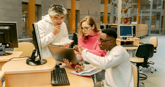 students-on-laptop-in-library
